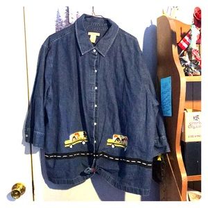 Gene shirt with school bus stitching.